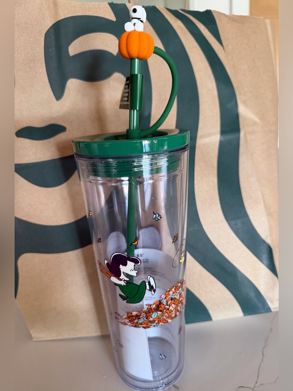 The 24-ounce Cold Cup features Snoopy